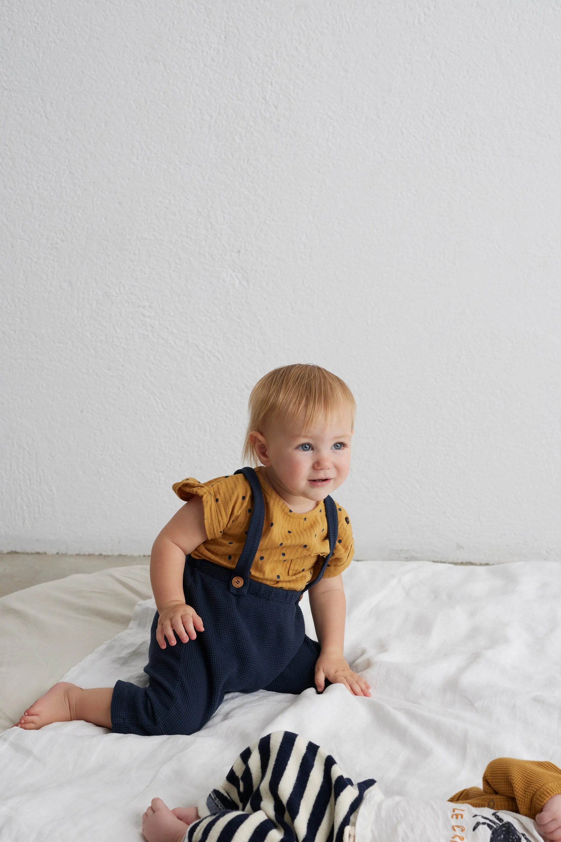 Polka-dot muslin baby top